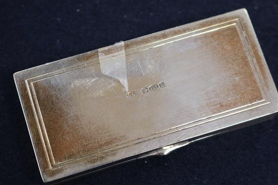 An Edwardian silver and enamel triple compartment stamp box, import marks for London, 1907, 8cm.